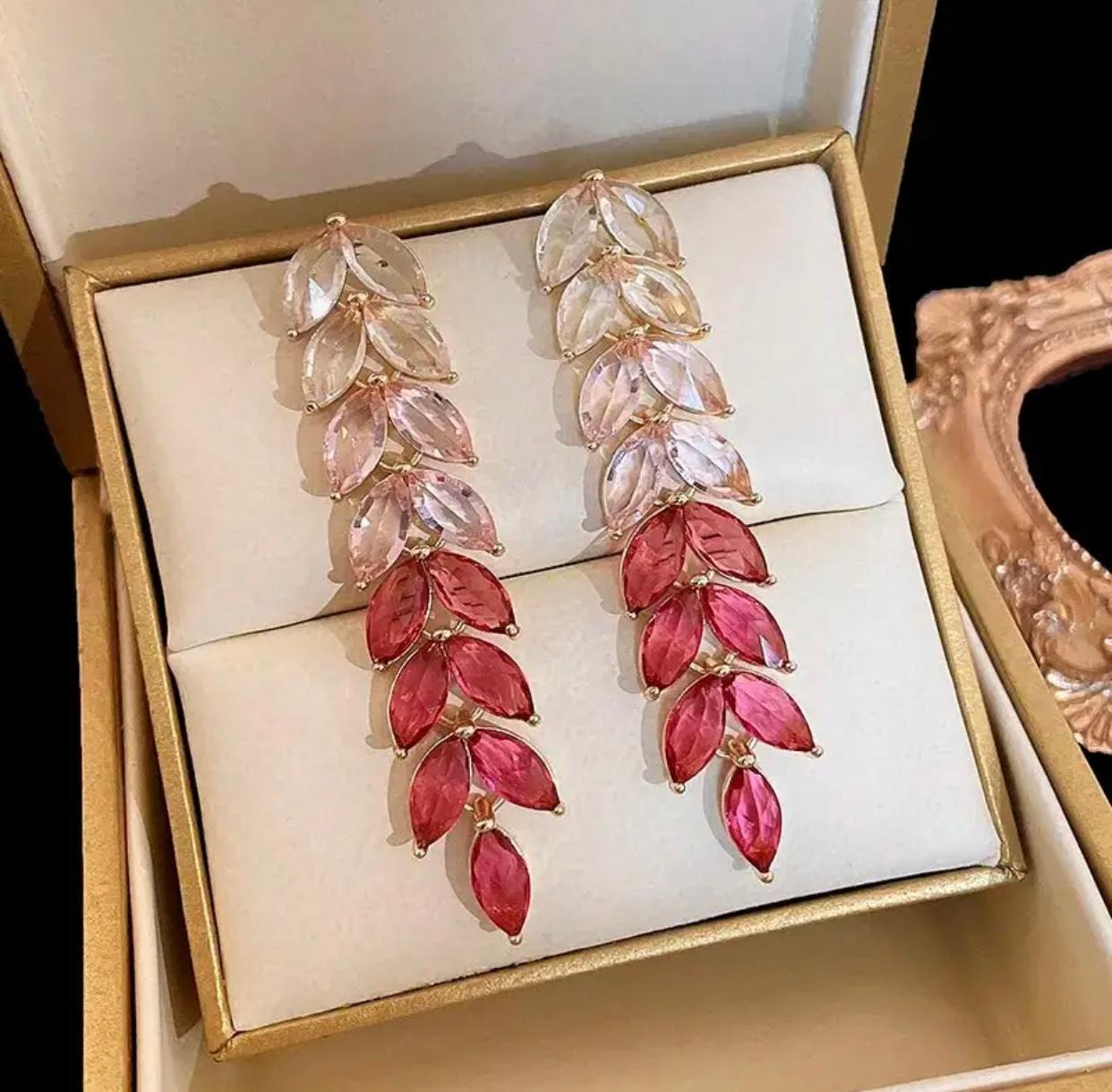 Beautiful red leaf earrings with a long drop design