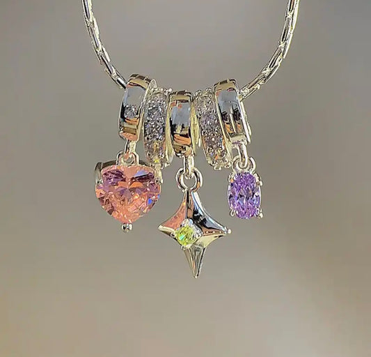 A beautiful charm necklace made with shimmering rhinestones