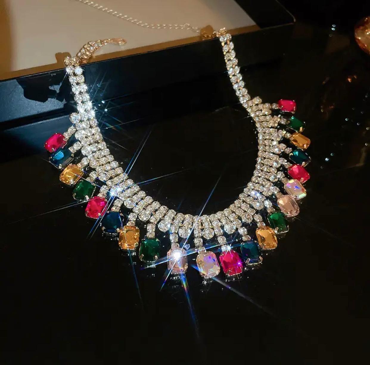 A vibrant luxury rhinestone necklace with multicolored gemstones