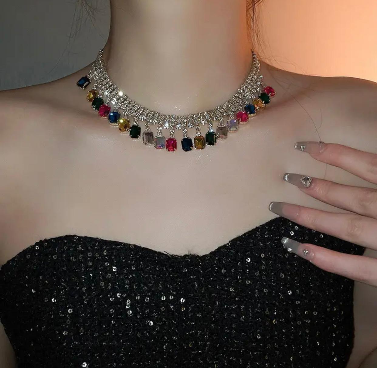 A necklace featuring a dazzling array of colorful rhinestones