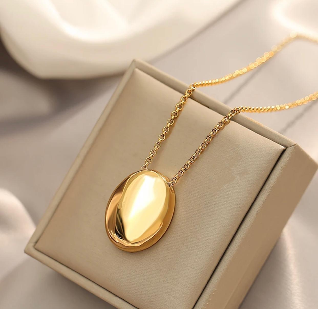 A long pendant necklace with a unique oval shape