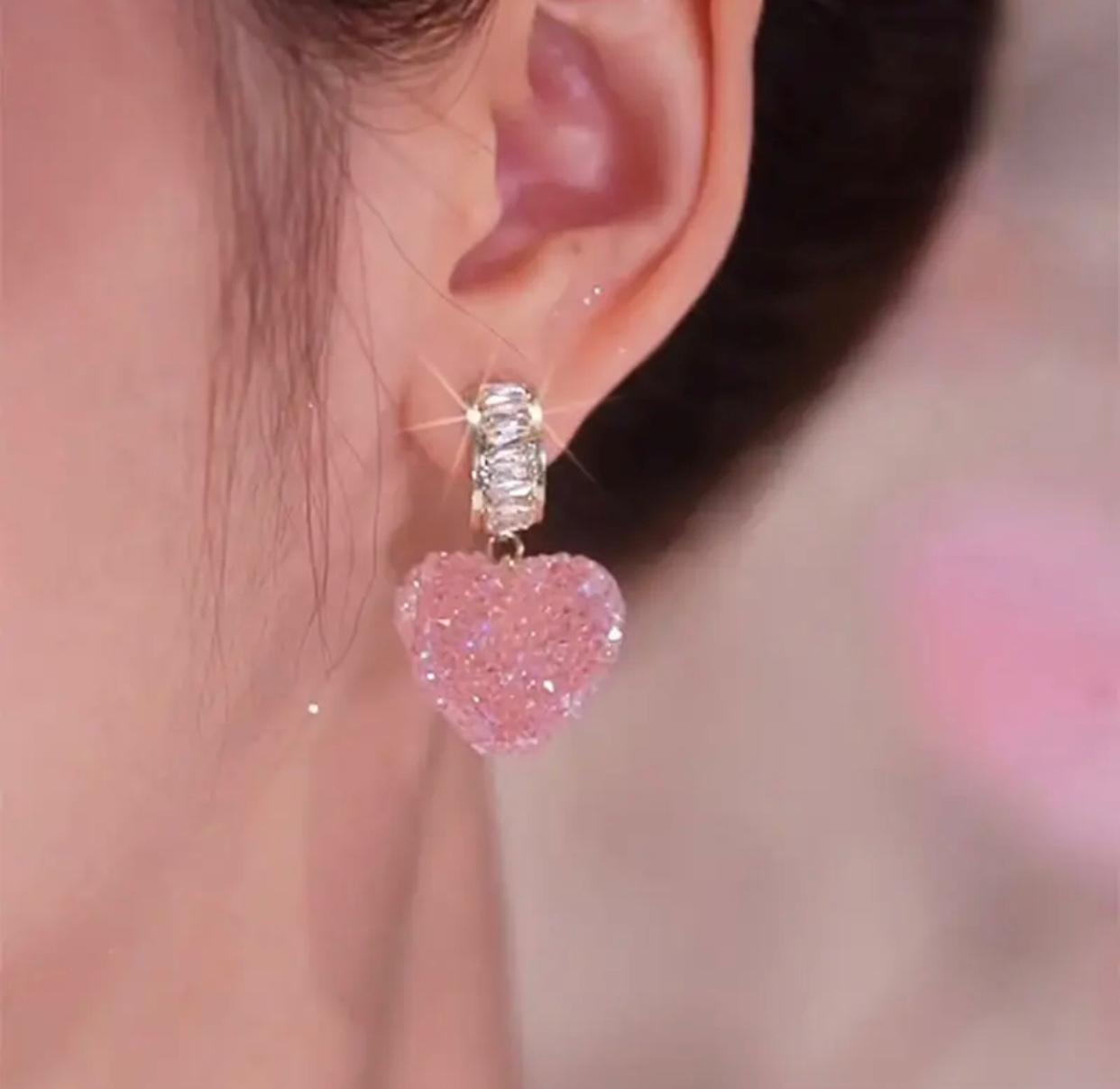 A sparkling pink crystal earrings