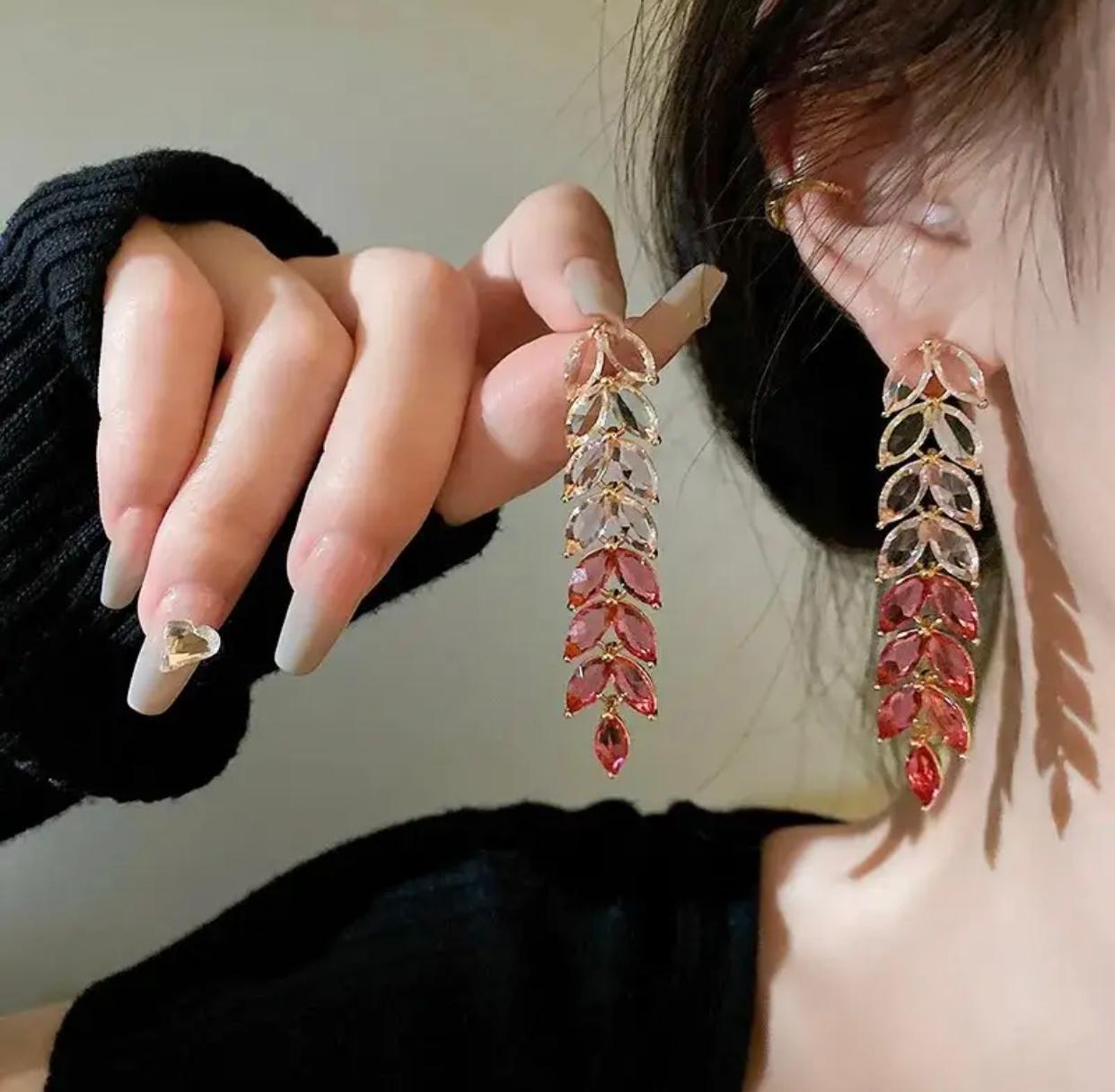 Stylish red leaf long drop earrings, exquisitely detailed with shimmering rhinestones 