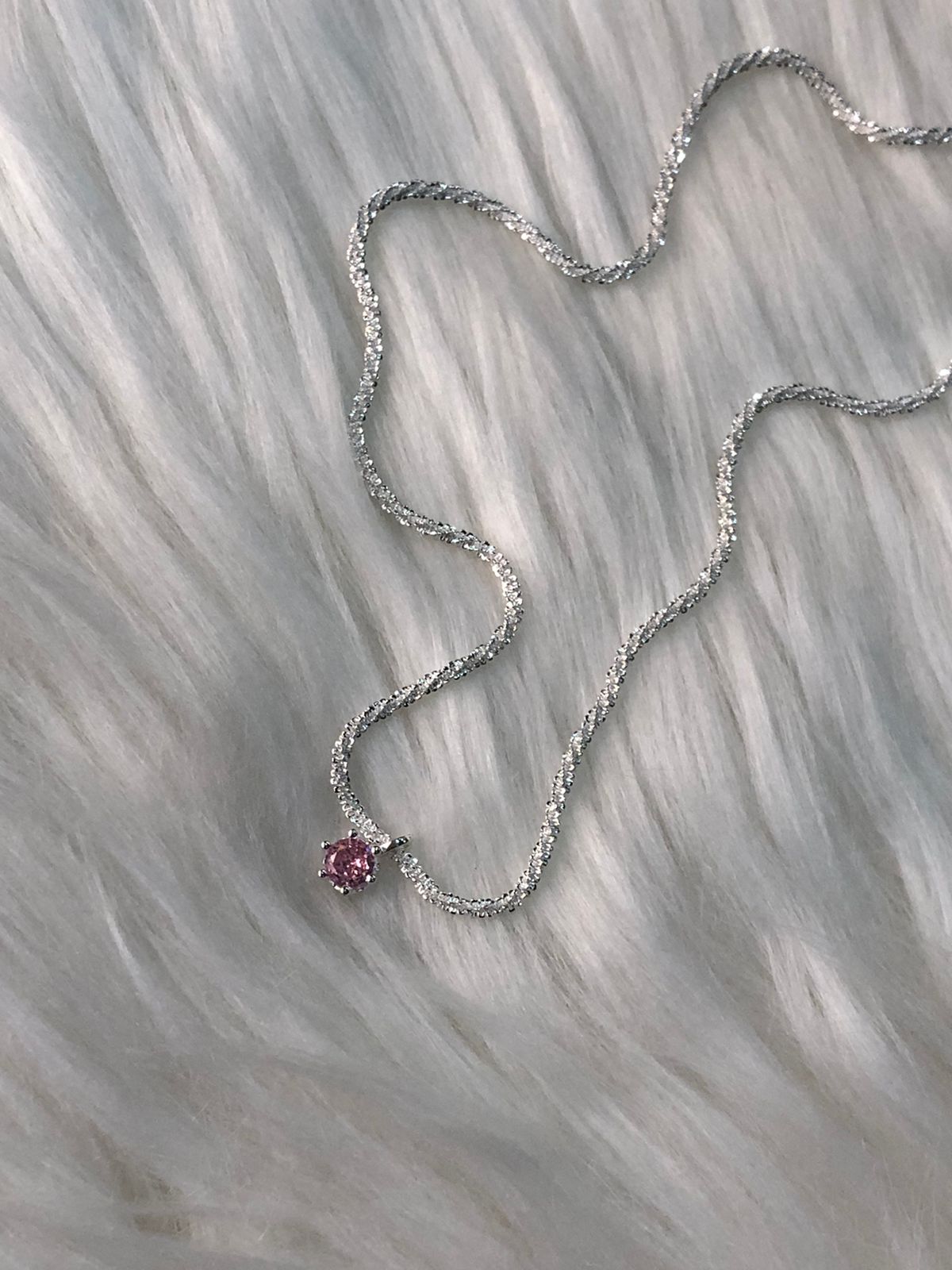 A high quality rose pink crystal pendant necklace with a sterling silver chain